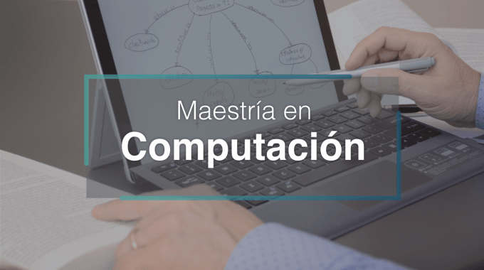 computadora con datos y libro a la par.