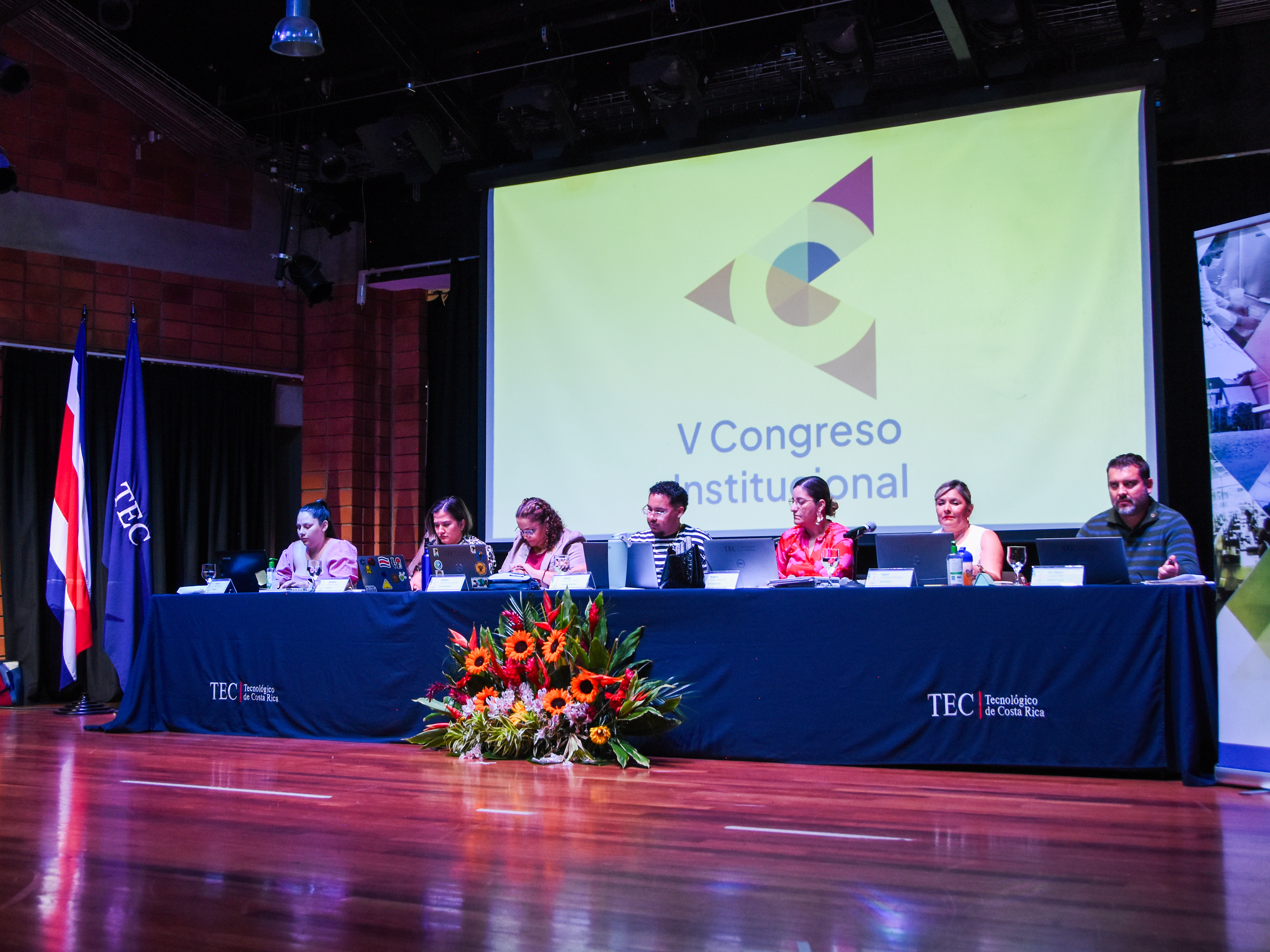 personas en auditorio